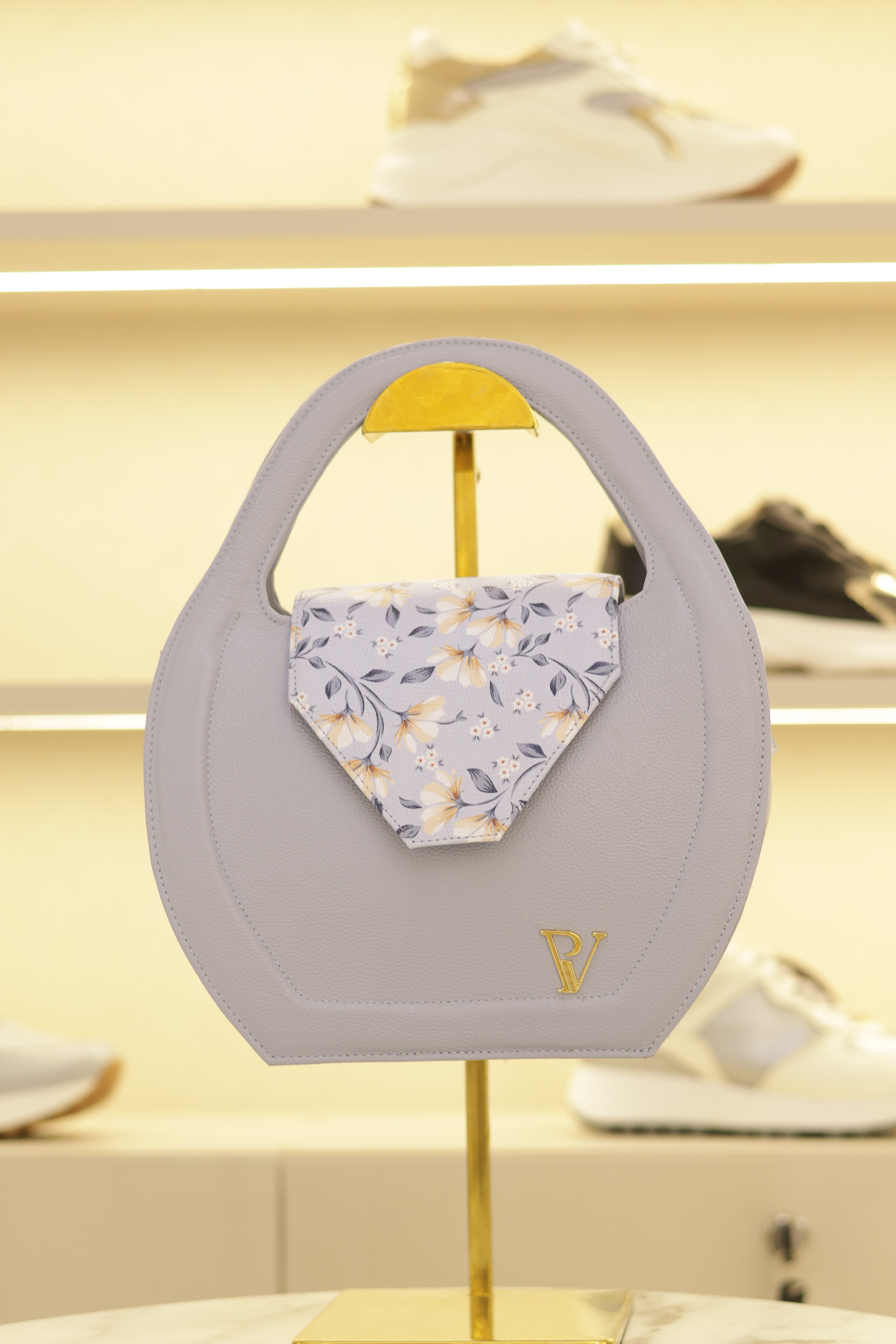 Bolso de cuero baby blu redondo