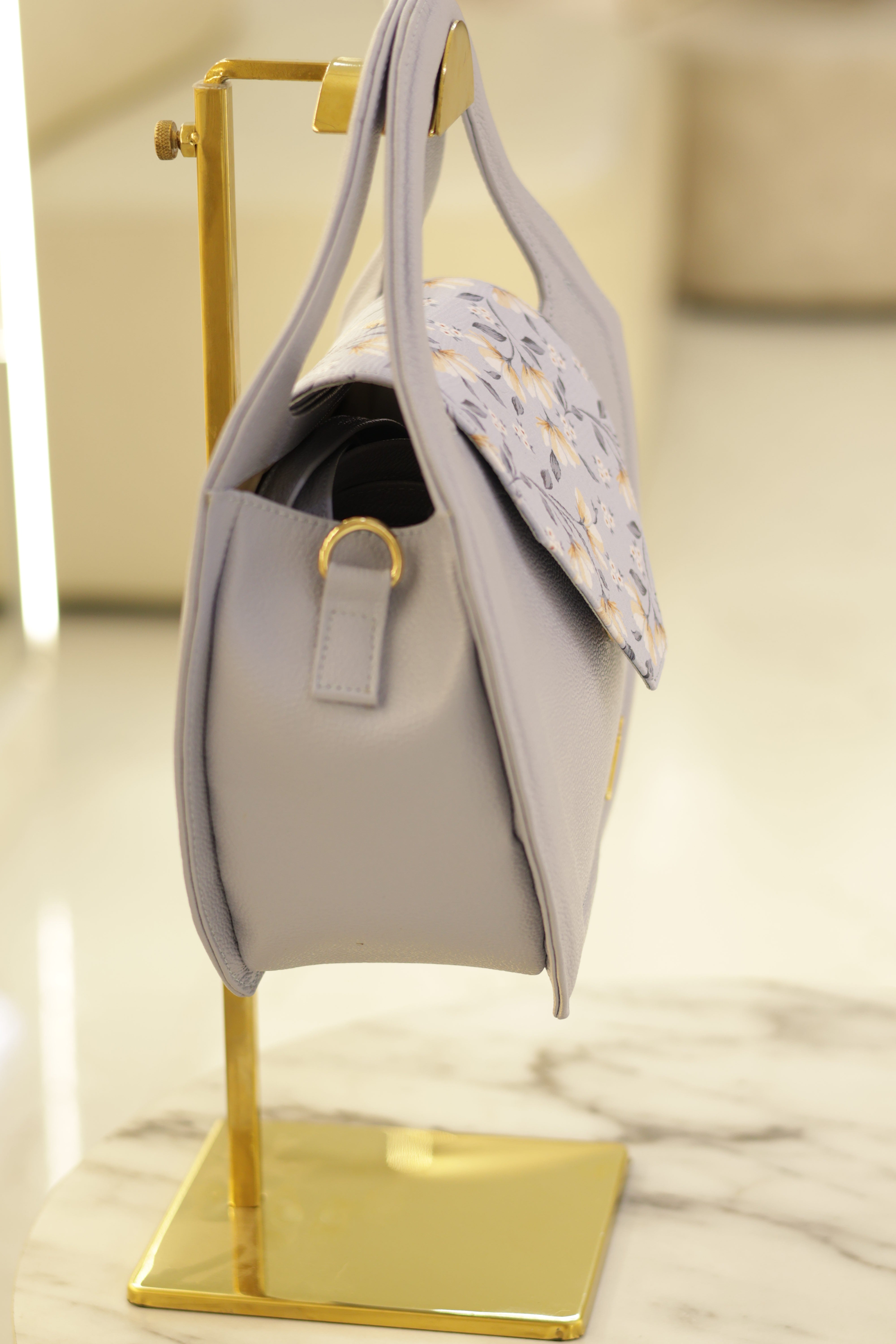Bolso de cuero baby blu redondo