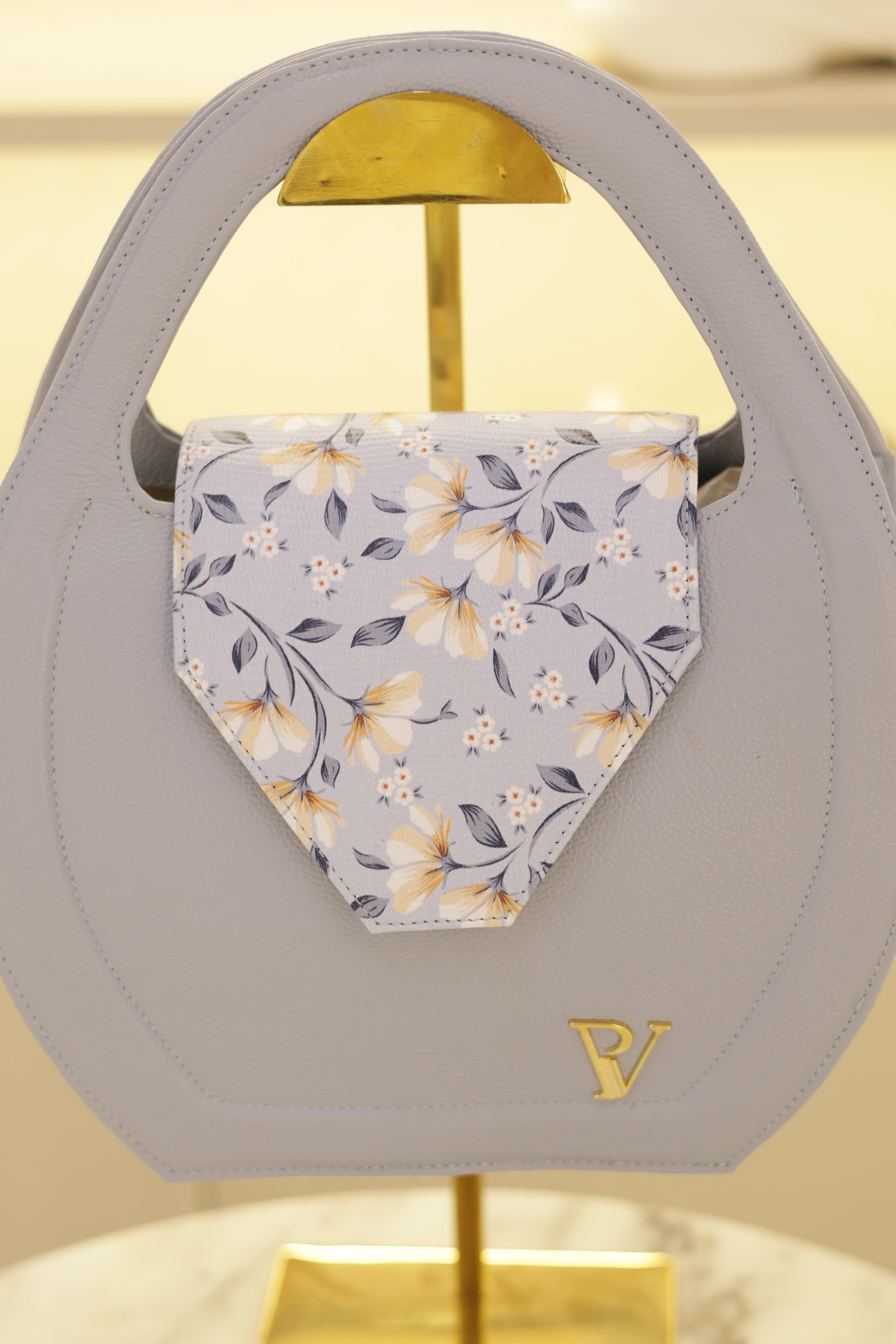 Bolso de cuero baby blu redondo