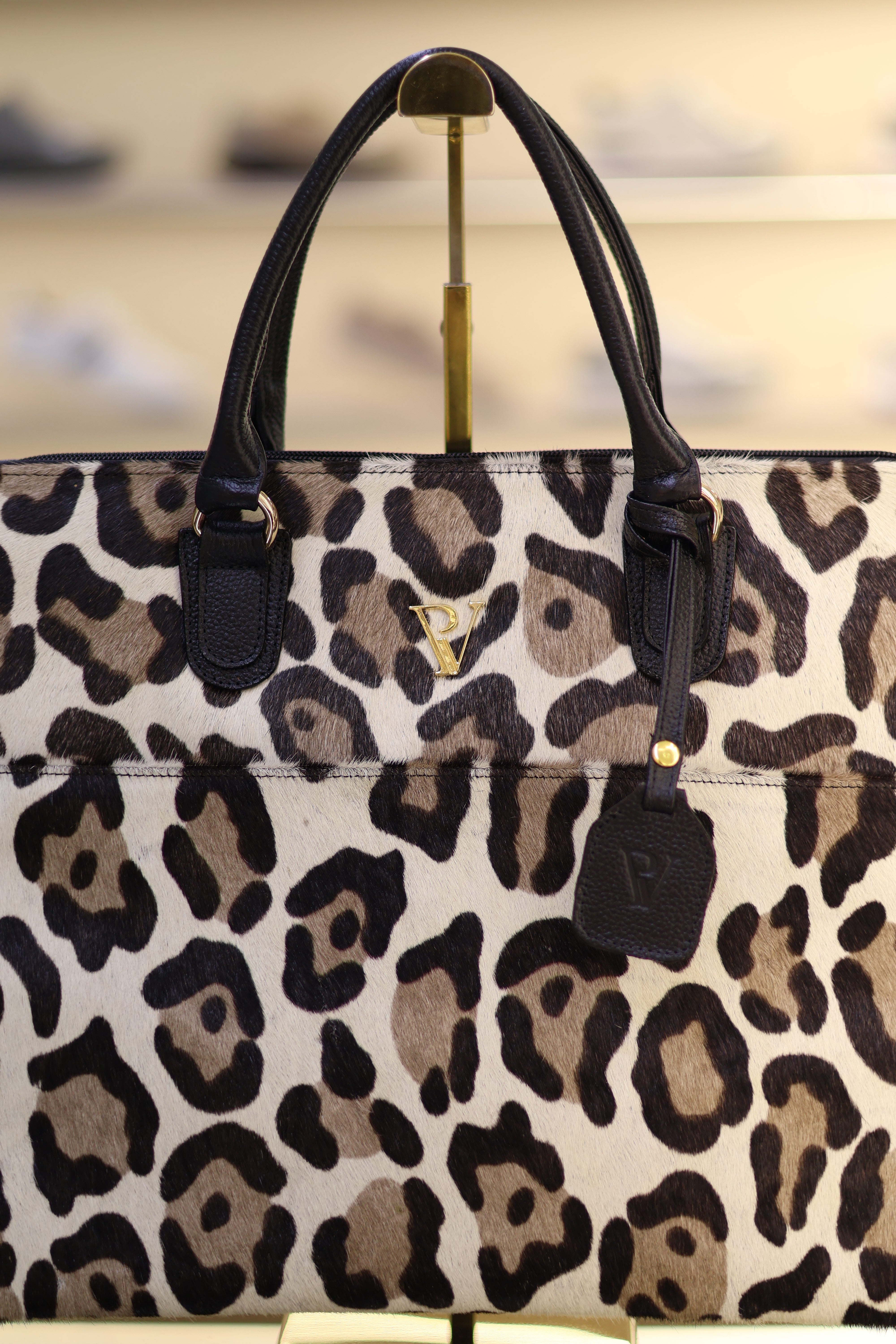 Bolso de cuero ejecutivo animal print